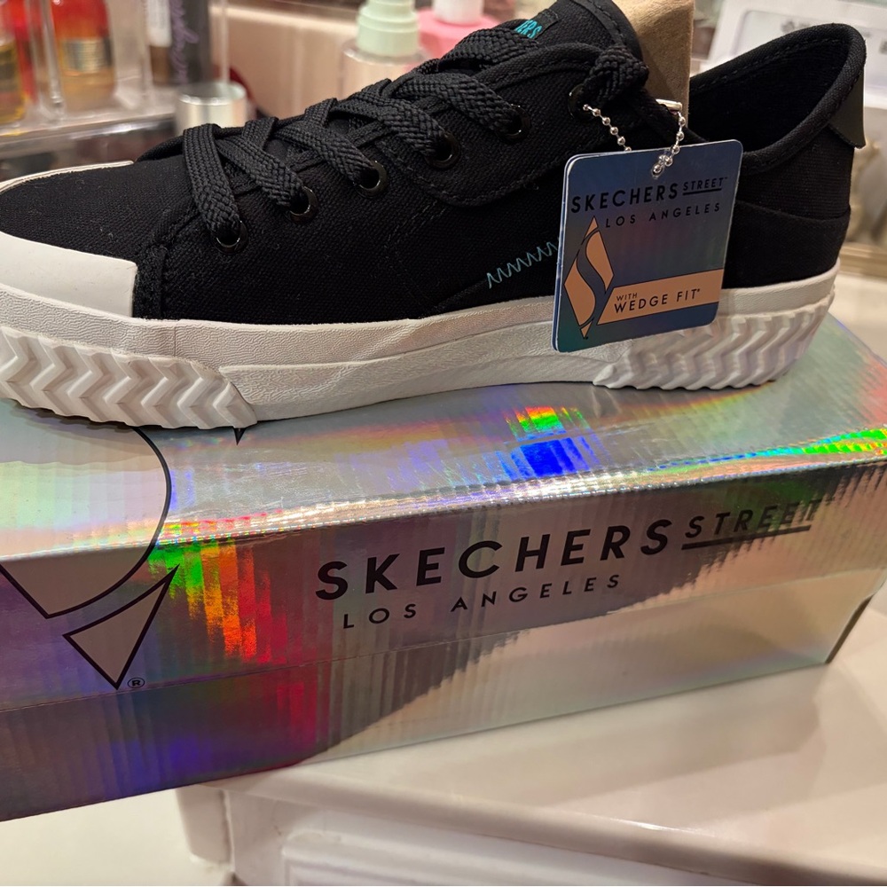 Skechers Black Canvas Sneakers with White Sole